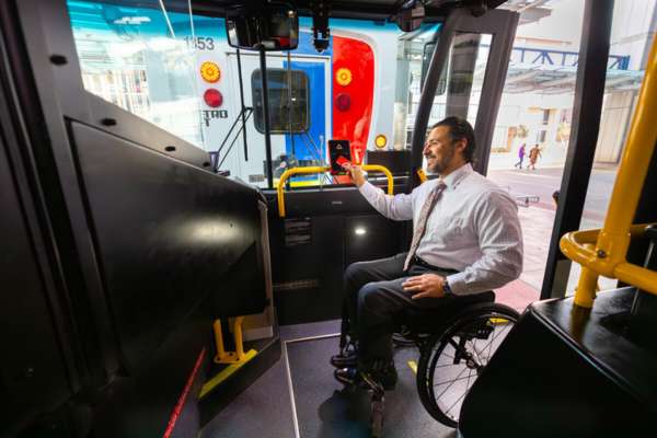 METRO board member Angel Ponce rides the METROLift.